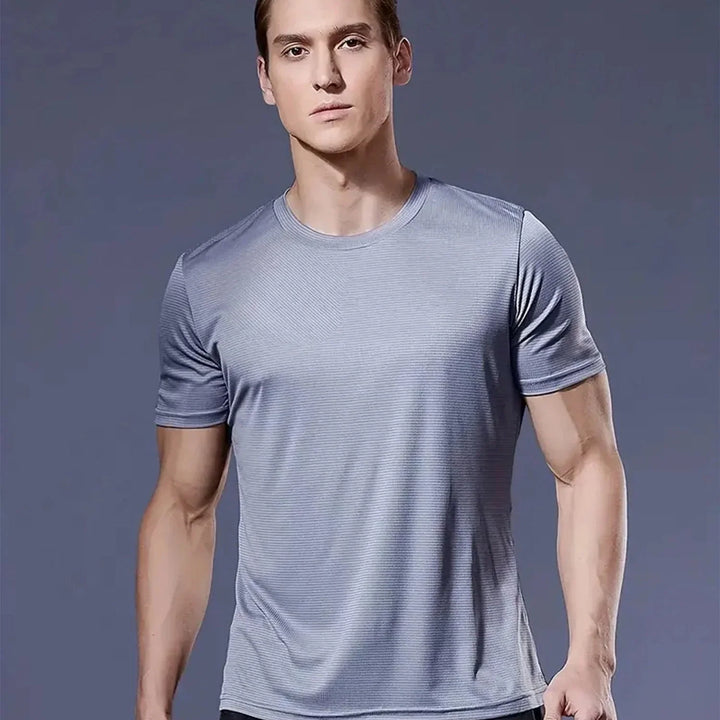 Compre 3 e leve 5 Camiseta Olympia™ com Tecnologia Dri-Fit e Design Atlético, Performance Imbatível e Conforto Máximo para Atletas Determinados